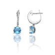 Immagine di CANDIES ORECCHINI ORO BIANCO CON BRILLANTI BIANCHI E TOPAZIO AZZURRO 1O01615B2500P